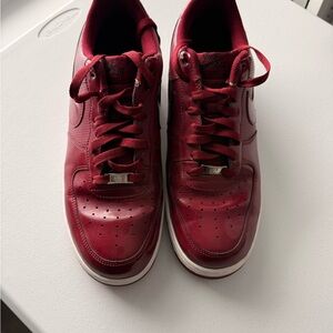 Nike Air Force 1 '07 'Team Red' sneakers in patent leather.